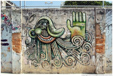 Graffiti Green Cyclops With Hand Villa Magdalenda Neighborhood Rua