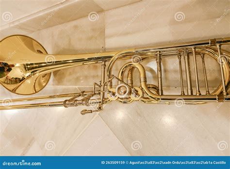 Trombone, Air Musical Instrument Resting on the Marble Floor. Stock ...