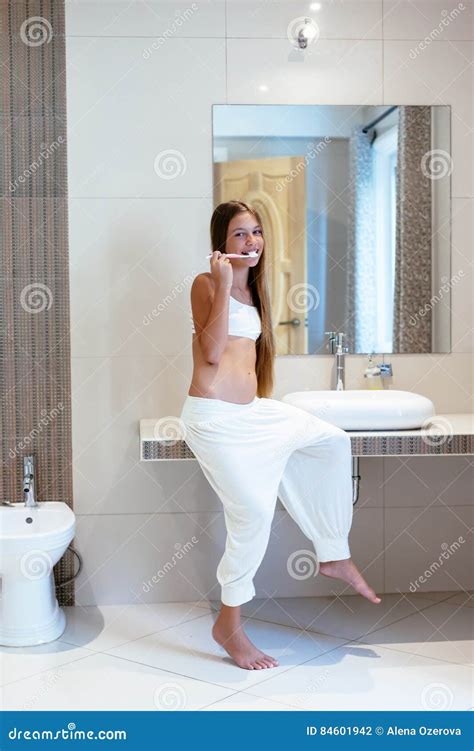 Pre Teen Girl In The Hotel Bathroom Royalty Free Stock Image 84601942