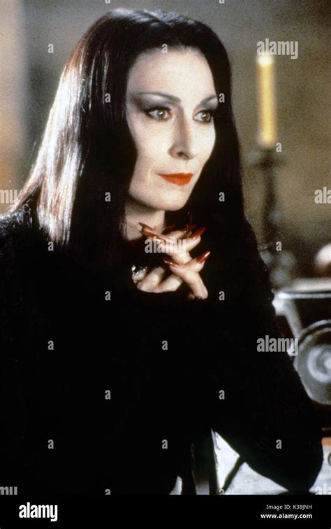 THE ADDAMS FAMILY ANGELICA HOUSTON as Morticia Addams Date: 1991 Stock ...