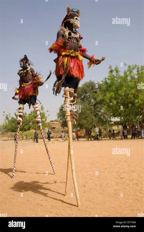 West Africa, Mali, Dogon Country, Sangha Village, Dogon Dances, Dancers On Stilts Resembling ...