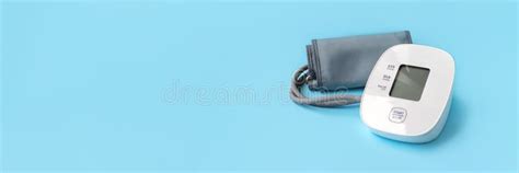 Automatic Blood Pressure Monitor on Blue Background Banner Stock Image ...
