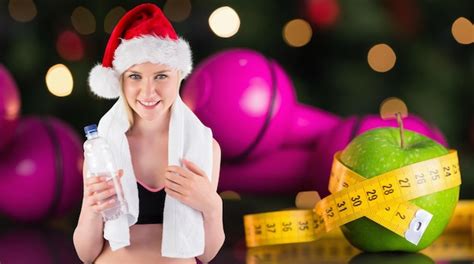 Premium Photo Festive Fit Blonde Smiling At Camera Against Measuring Tape