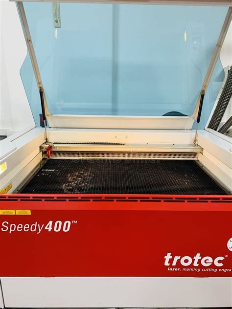 Closeup of Programmable Laser Cutting Machine Engraving Picture ... 