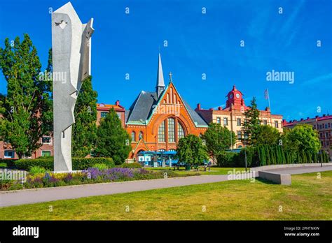 Statue Of A Woman At Picasso Park And Immanuel Church In Swedish Town