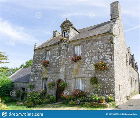 Typical Breton Stone Houses In The Picturesque French Village Of