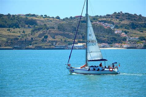 Photo of a Moving Sailing Boat on the Water · Free Stock Photo