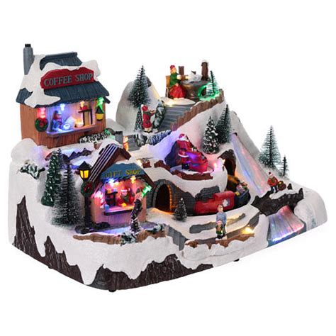 Animated Christmas village with coffee shop 25x40x25cm | online sales ...