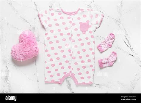 Stylish baby clothes on white background Stock Photo - Alamy