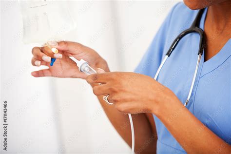 Hospital: Setting Up An Intravenous Drip Stock Photo | Adobe Stock