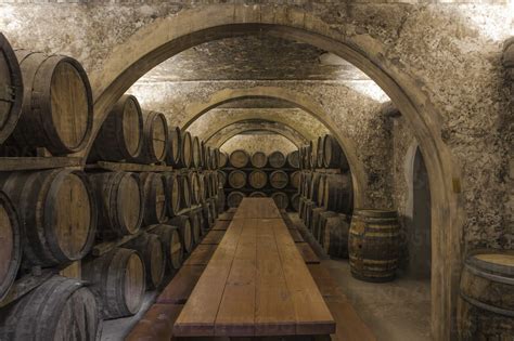 Wine Barrels In Wine Cellar Stock Photo