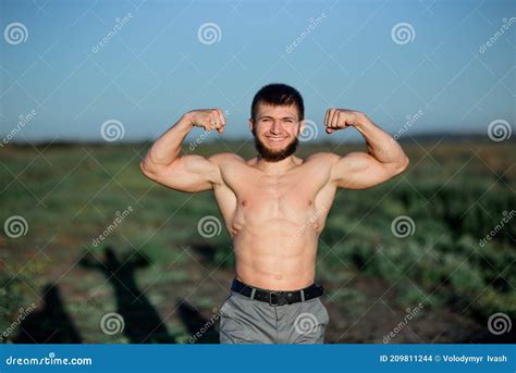 Bearded Body Builder Poses With Naked Chest On A Green Field Stock Photo Image Of Fairytale
