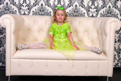 Girl and leather sofa stock photo. Image of lifestyle - 63119628 