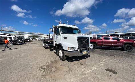 2020 Volvo VHD64 60 000 LB Pac Mac Roll Off Truck Tampa FL 57731580