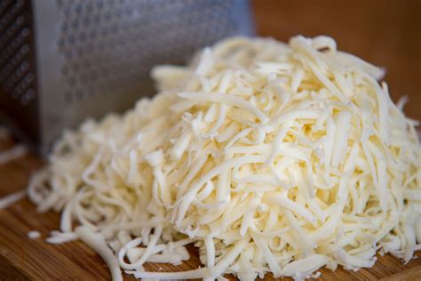 How To Grate Cheese Without A Cheese Grater Using These Hacks