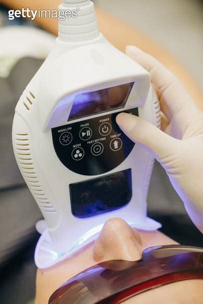 Teeth Whitening Using An Ultraviolet Lamp Dentist Doing Teeth