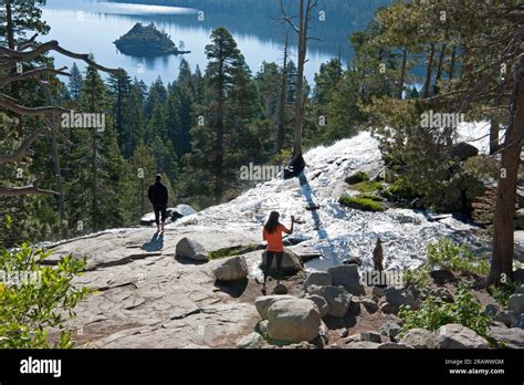 A Couple Enjoying The Scenery Near The Waterfall In Emerald Bay State