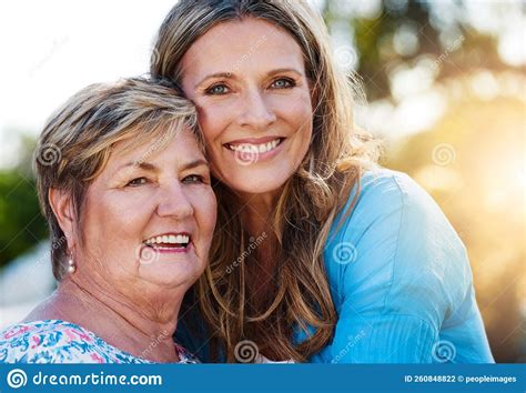 My Mom Is One In A Million Portrait Of A Happy Mature Woman Hugging Her Mother Outdoors Stock