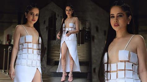 Urfi Javed FLAUNTS her shapely legs in thigh-high slit white dress – Watch VIRAL video