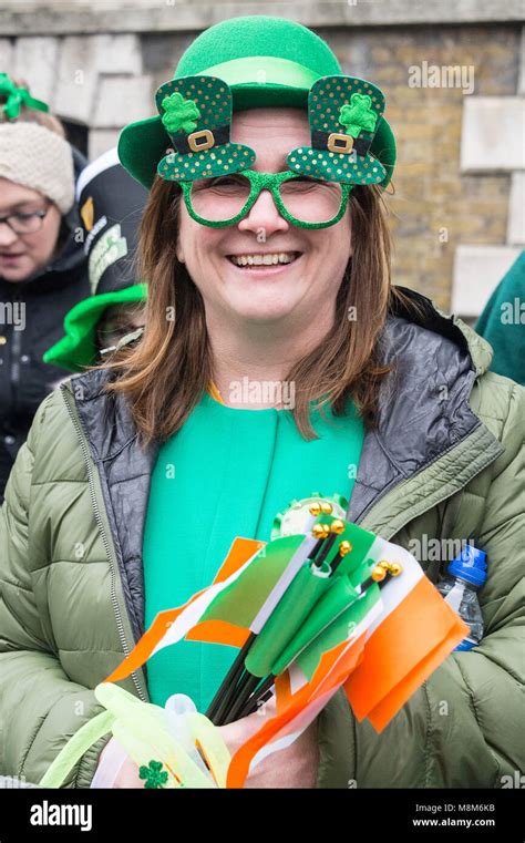 London Britain 18th Mar 2018 A Reveller Watches The Parade Along