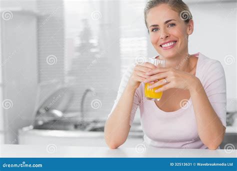 Cheerful Blonde Having Orange Juice Stock Image Image Of Fair Domicile