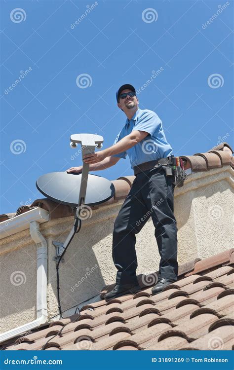 Satellite Installer on Roof Stock Image - Image of worker, stucco: 31891269