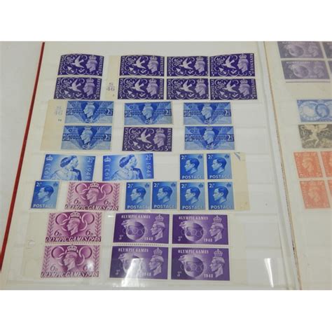 A Red Stock Book Containing A Massive Collection Of Mint Gb Stamps From