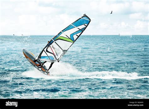 Windsurfer Fun In The Blue Ocean With Waves Stock Photo Alamy