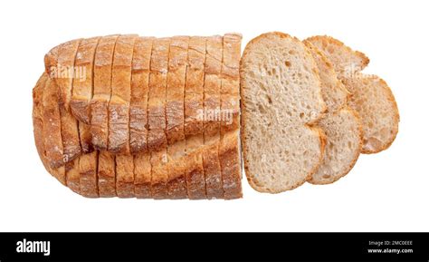 Sliced white wheat bread cutout. Wholegrain bread loaf and slices isolated on a white background ...