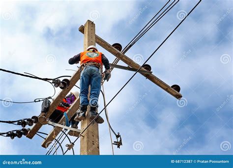 Electrician Lineman Repairman Worker At Climbing Editorial Photography