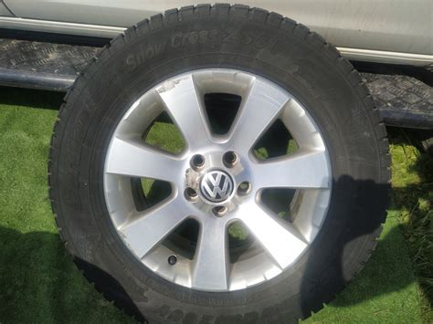 Шины зимние шипованные Cordiant 215/65 R16, литые диски Volkswagen 6 ...