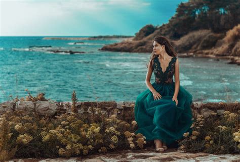 Wallpaper Women Outdoors Sea Flowers Rock Shore Brunette Sky