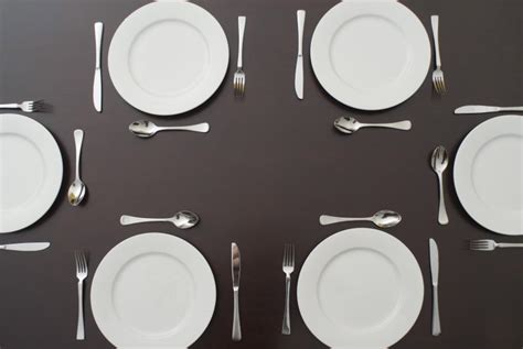 table set  white plates  cutlery  stock image