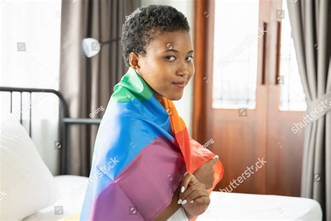 Black African Lgbt Woman Holding Lgbtq Rainbow Flag Lesbian Pride Or