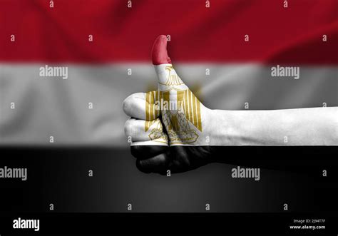 Hand Making Thumb Up Painted With Flag Of Egypt Stock Photo Alamy