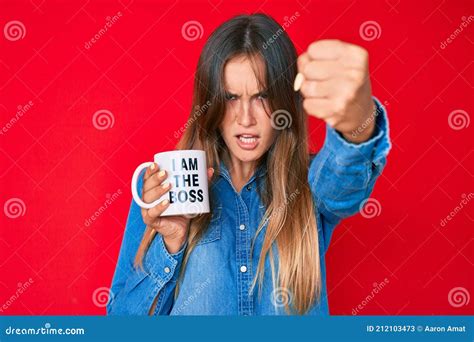 Beautiful Caucasian Woman Drinking From I Am The Boss Coffee Cup