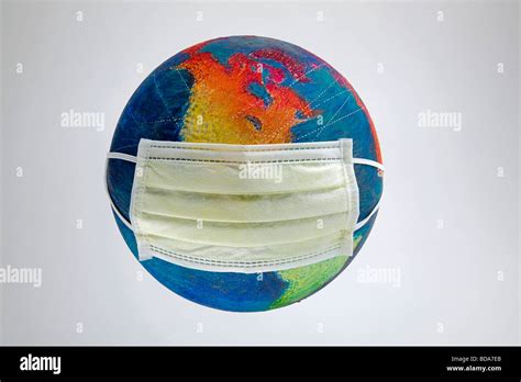 Still Shot Of A World Globe With A Breathing Mask On It Stock Photo Alamy