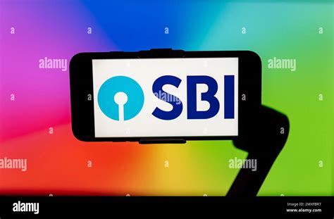 In this photo illustration, the state bank of India (SBI) logo is seen ...