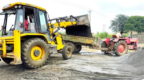 New Jcb Dx Xtra Machine Loading Red Mud In New Two Mahindra Tractor