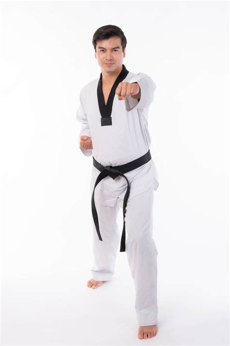 Premium Photo | Taekwondo punching , straight punch - black belt ...