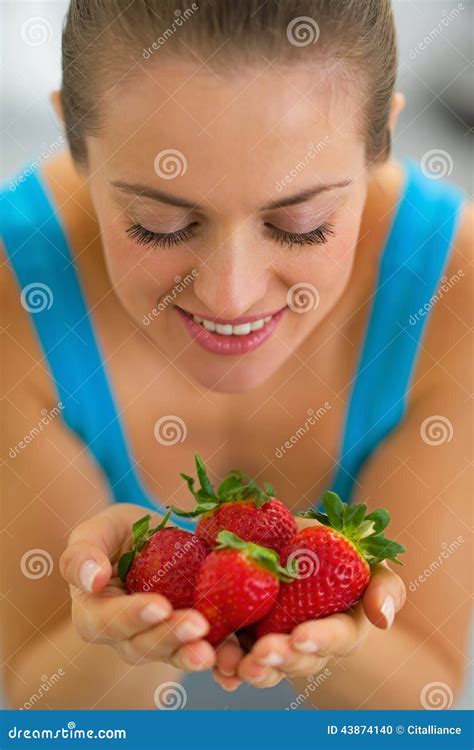 Portrait Of Young Woman Enjoying Strawberries Stock Photo Image Of