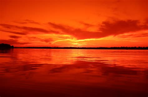 Free picture: Bright orange yellow sunset on lakeside with water reflection