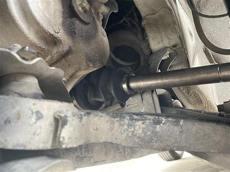 Is this bad CV axle boot looks like it’s sucked in : r/MechanicAdvice