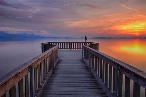 Landscape Photography Of Brown Wooden Pier On Lake Under Clear Sky