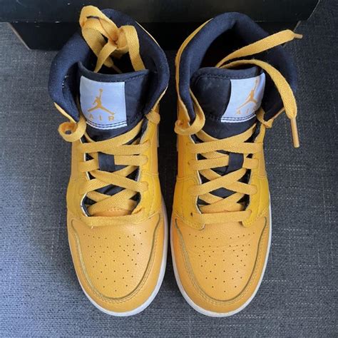 Air Jordan 1 Mid Gs University Goldblack White Depop