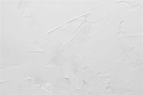 Premium Photo | Texture of white plaster.