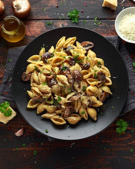 Carbonara Mushrooms Pasta Conchiglie with Creamy Sauce, Parmesan Cheese and Herbs Stock Image ...