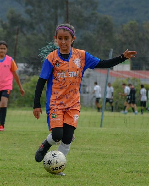 Girl Playing Football · Free Stock Photo