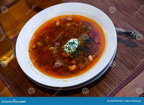 Traditional Russian Meat Soup Solyanka With Sour Cream And Lemon Stock