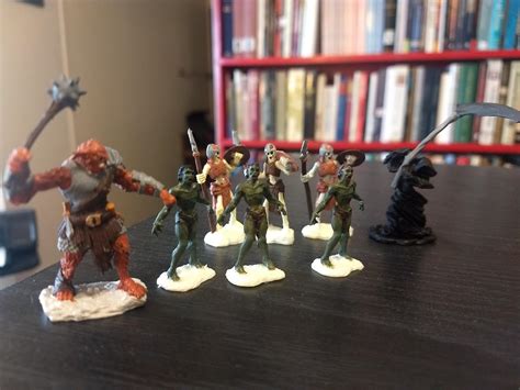 My wife has been painting undead figurines for a campaign I'm DMing. I think they're pretty good ...